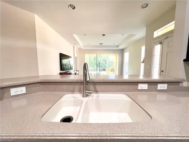 Corian Countertops & Updated Fixture/Disposal