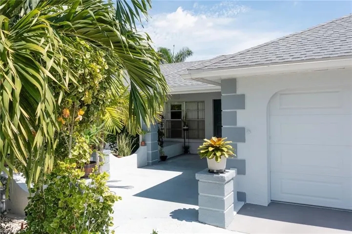Property entrance with a garage