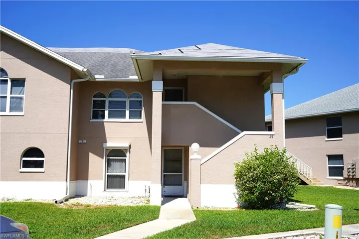 View of front of house with a front lawn