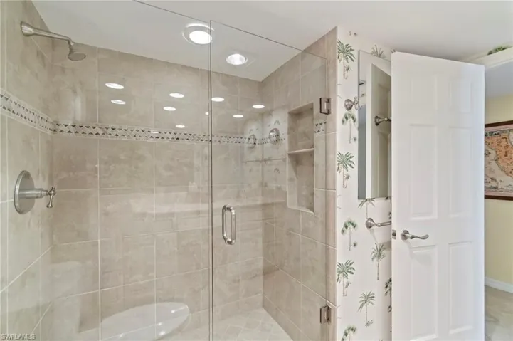 Primary Bathroom - large glass-enclosed shower.