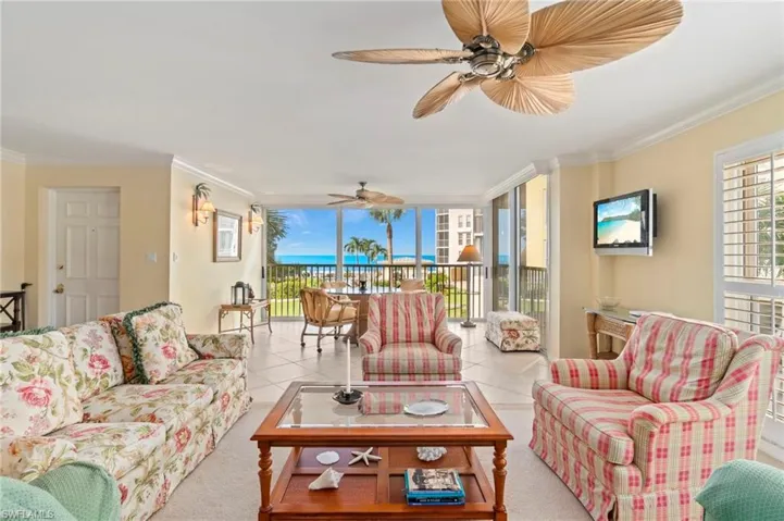 Light, bright & airy with ample windows & sliders on three sides of the condo, showcasing the natural light & Gulf view
