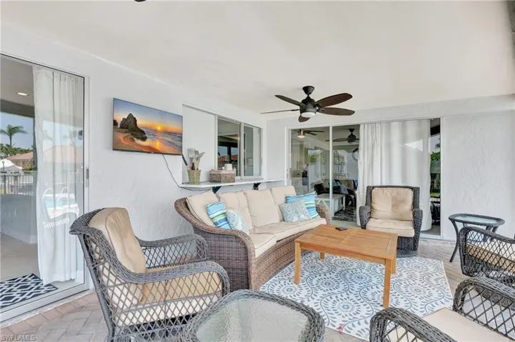 Living room featuring ceiling fan