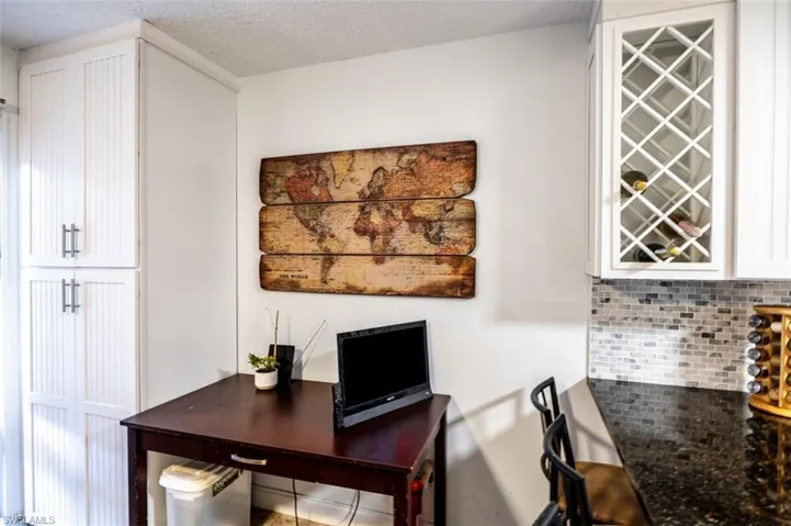 Office featuring a textured ceiling