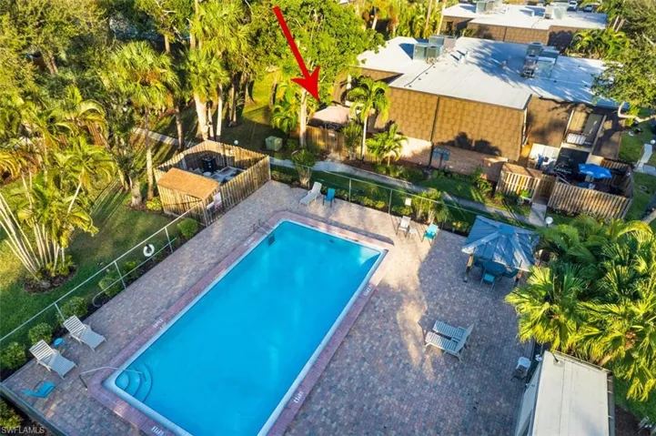 Community pool with a patio area