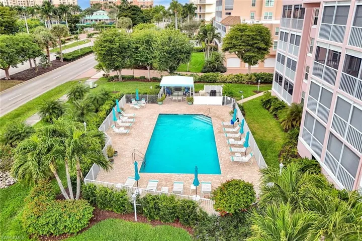 Community pool with a patio and a gazebo