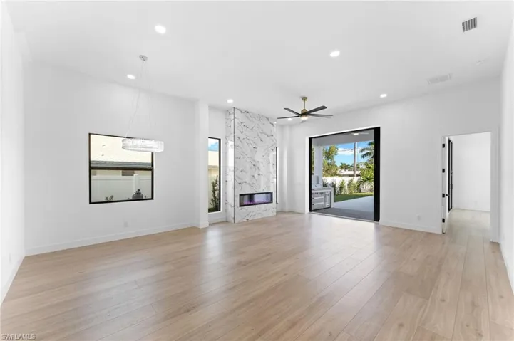 Open flooplan with living/dining room open to your outdoor oasis.