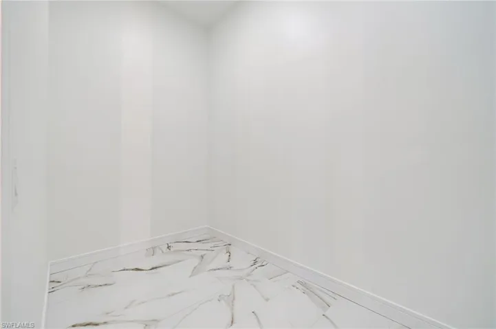 Expansive Primary Walk-in Closet
