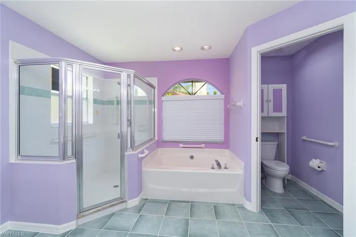 Bathroom with Walk Walk in shower, bathtub and water closet