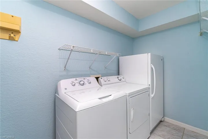 Laundry area with washer and dryer included
