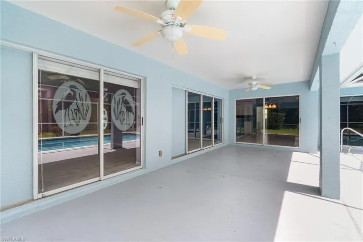Screened lanai with entry points to many areas within the home
