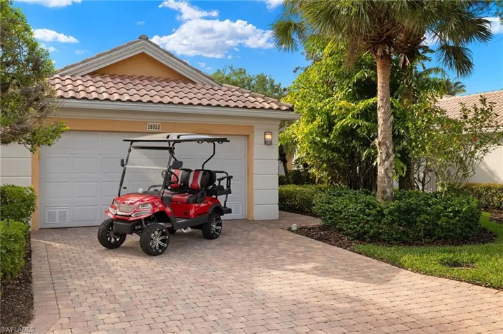 Sporty Golf Cart Included in the Sale!