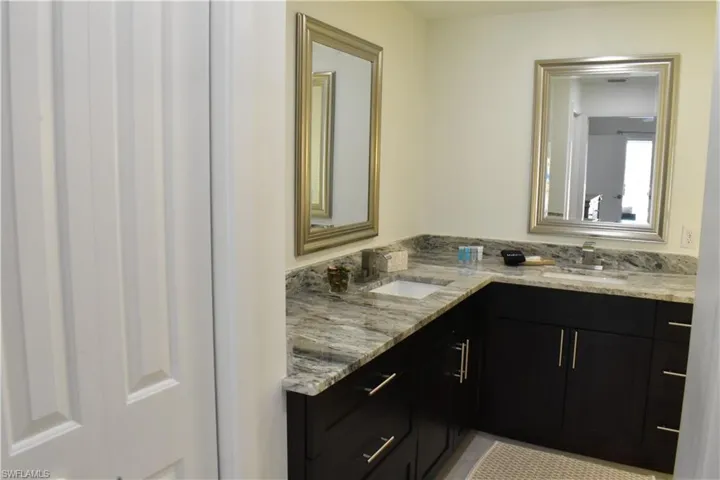 Bathroom featuring double vanity
