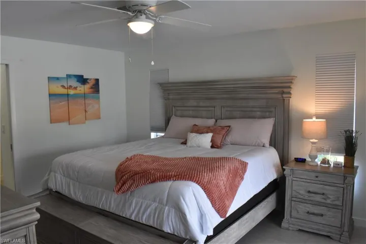 Bedroom featuring a ceiling fan