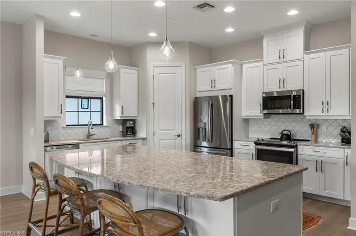 9645  MONTELANICO  LOOP, Naples, FL 34119