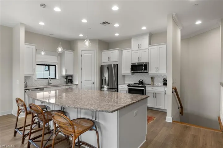 9645  MONTELANICO  LOOP, Naples, FL 34119