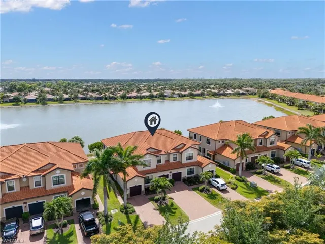 Drone / aerial view featuring a residential view and a water view