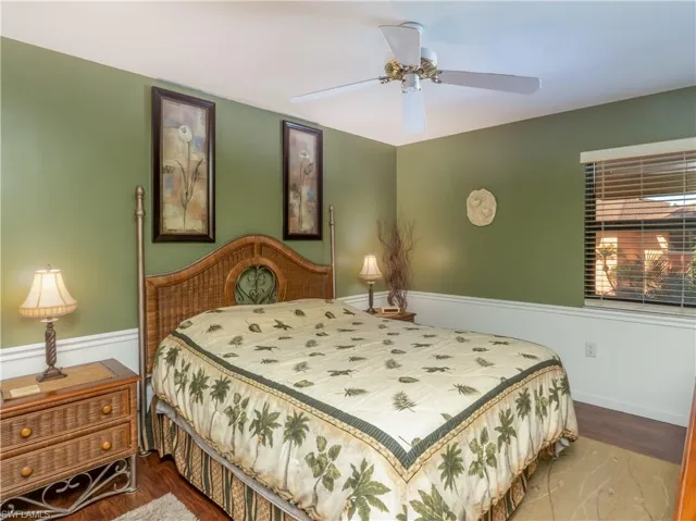 Primary bedroom featuring ceiling fan.