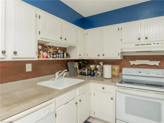 Kitchen featuring appliances.