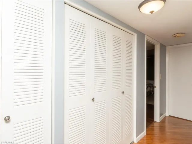 Hallway featuring closet space.