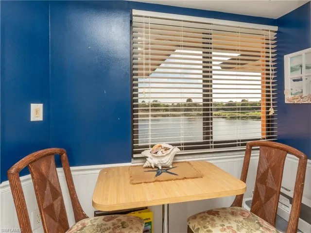 Breakfast area in kitchen with window.