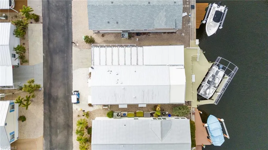 Birds eye view of property and canal