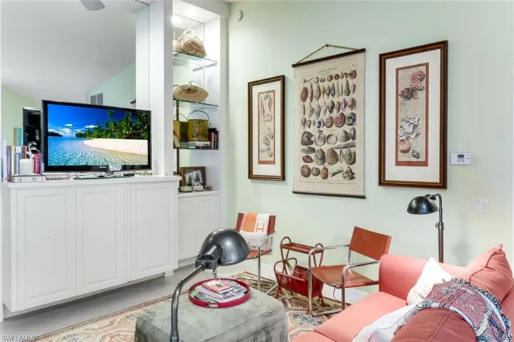 Living room featuring light tile patterned floors