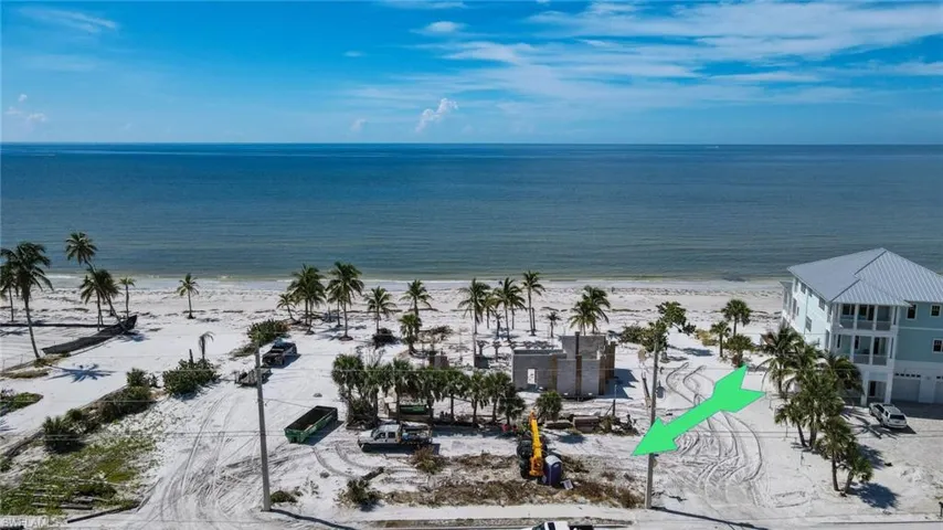 Property view of water with a beach view