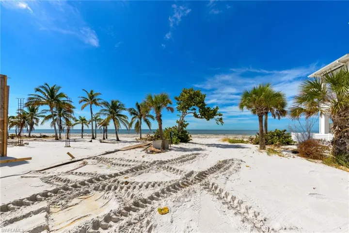 View of yard featuring a view of the beach and a water view