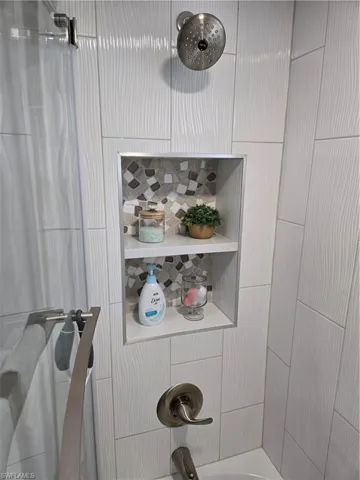 Details featuring tiled shower