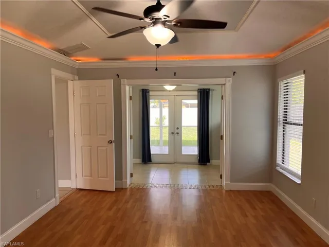 Tray ceiling with cove lighting and ceiling fan