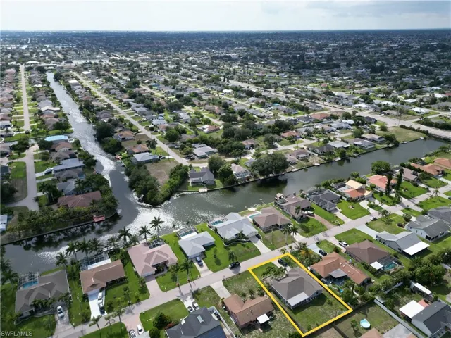 Aerial view showcasing a residential area characterized by numerous single-story homes.