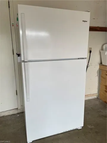 White top-freezer refrigerator with dual doors