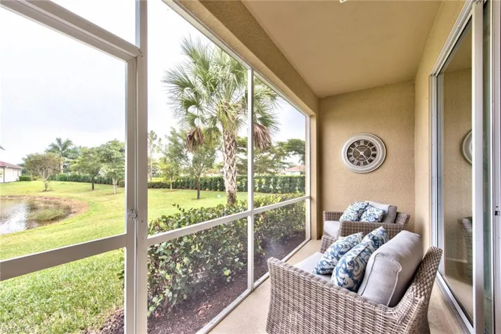 Screened in lanai with a lake view