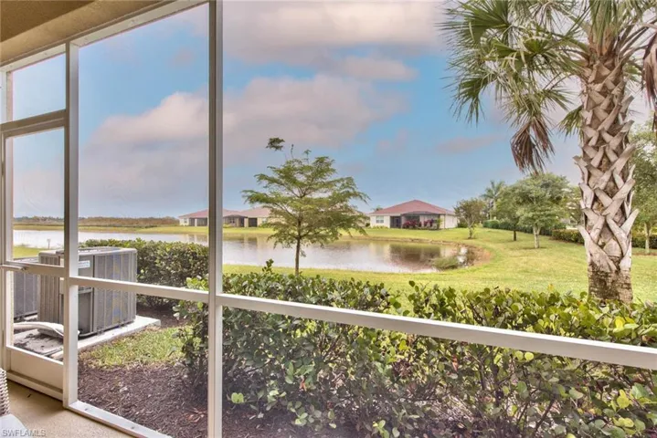 Screened in lanai with a lake view