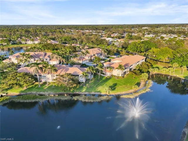 Drone / aerial view featuring a residential view and a water view