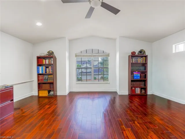 Bonus Room featuring dark wood finished floors, ceiling fan, vaulted ceiling, and recessed lighting