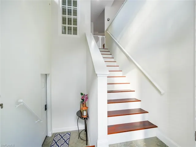 Stairs featuring baseboards