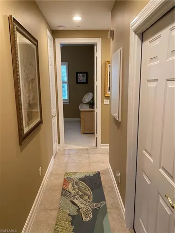 Hall featuring baseboards