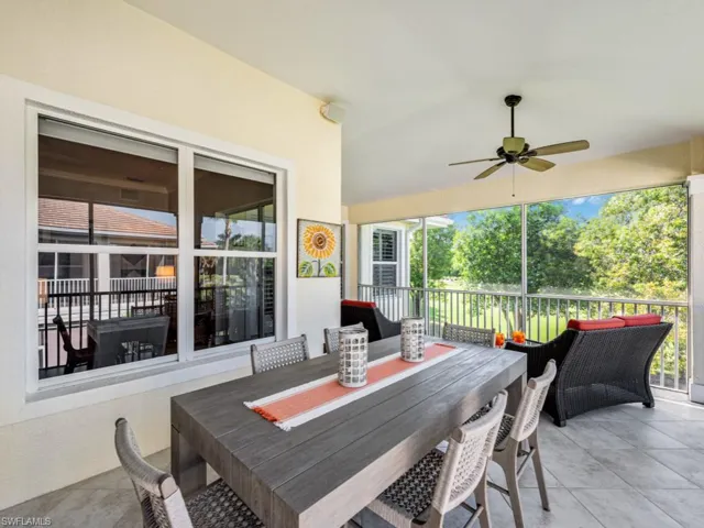 View of patio / terrace featuring a balcony and ceiling fan