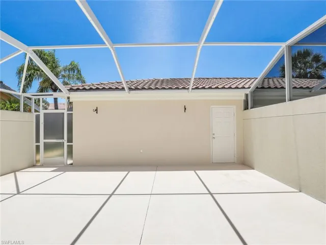 View of patio / terrace with a lanai