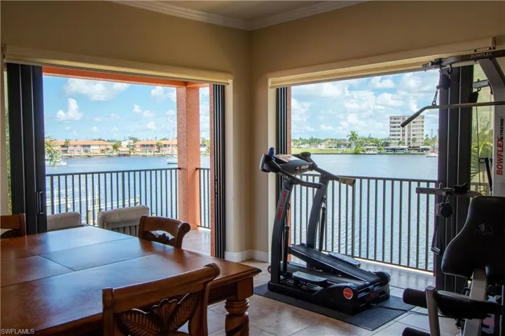 2nd floor view overlooking Bimini Basin. Sliders lead to wrap around balcony. Wet bar is to the left(out of sight).