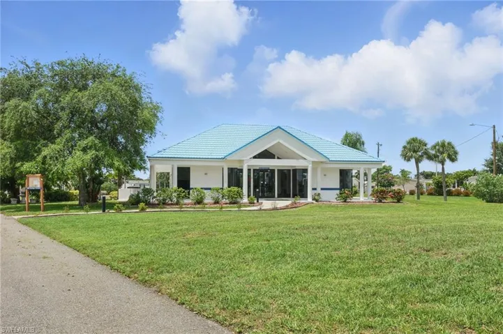 Free Standing Gym Building with tiled roof, and covered porch
