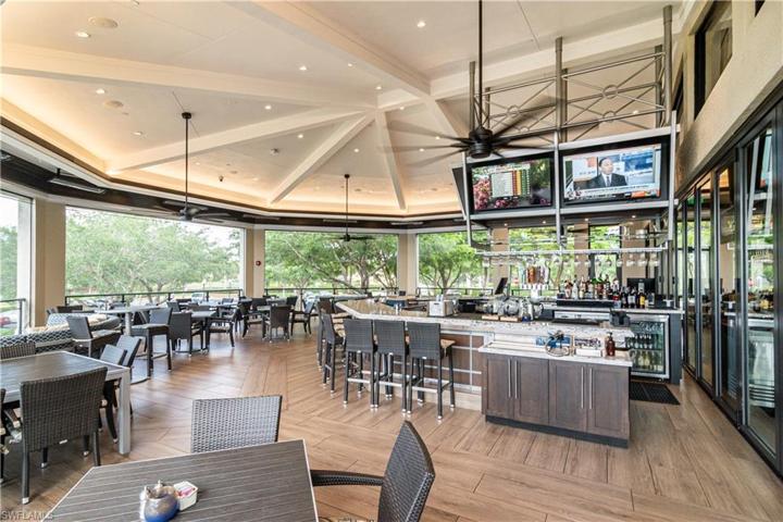 Exterior patio dining with fire pits in Grille Room at Clubhouse