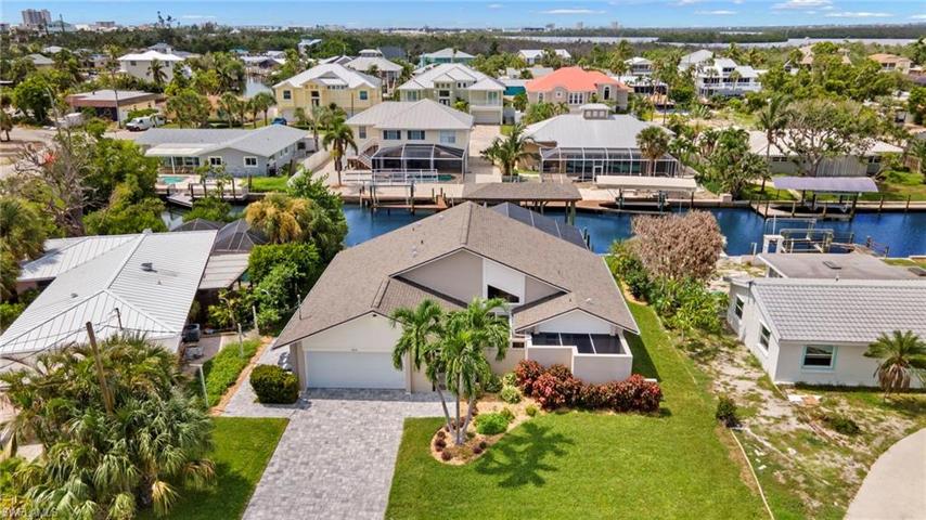 Front of home with canal behind