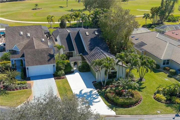View of subject property featuring a golf course