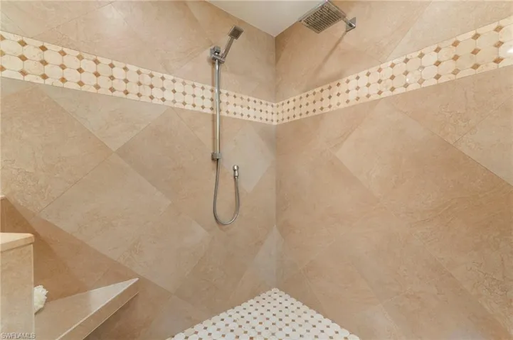 Bathroom featuring tiled shower