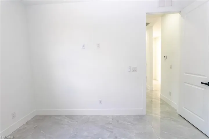 Bedroom with baseboards