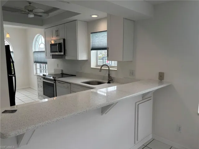 Counter bar provides plenty of additional counter space to entertain or have a meal. Or just watch the chef in the beautiful new kitchen