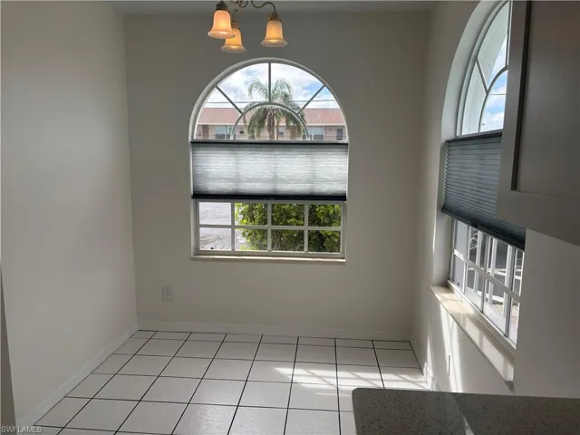 The front breakfast room is bright and cheery with natural light even if you prefer to close the lower blinds for privacy.
