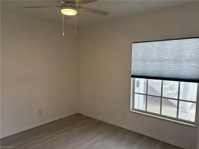 Front guest bedroom has ceiling fan, new window treatments and cable ready